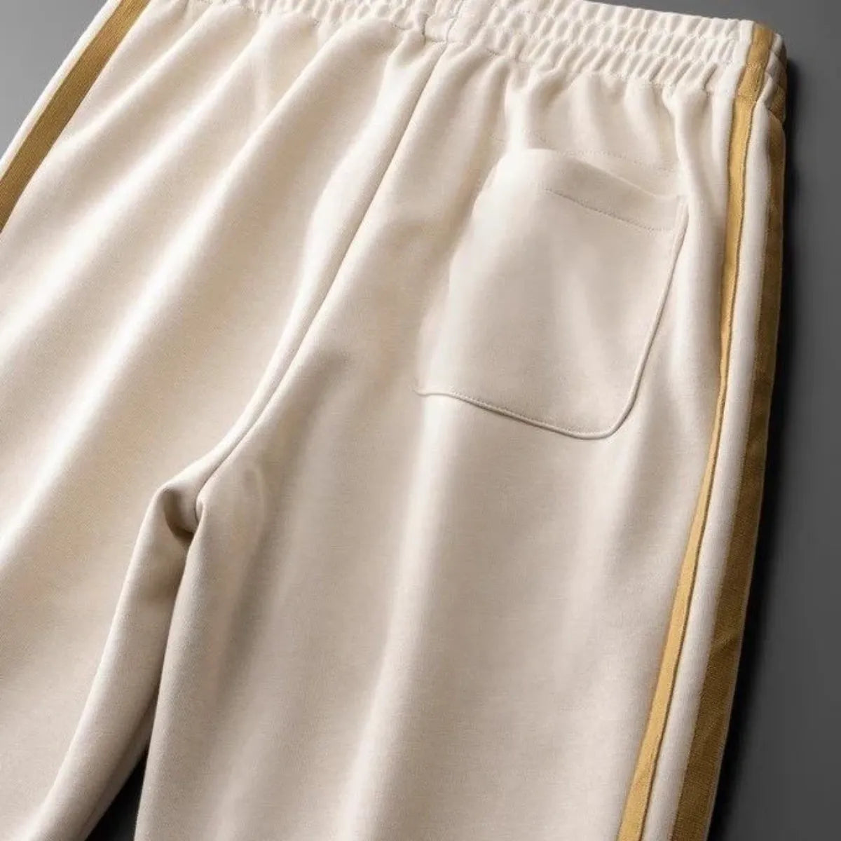 beige trackpants back pocket